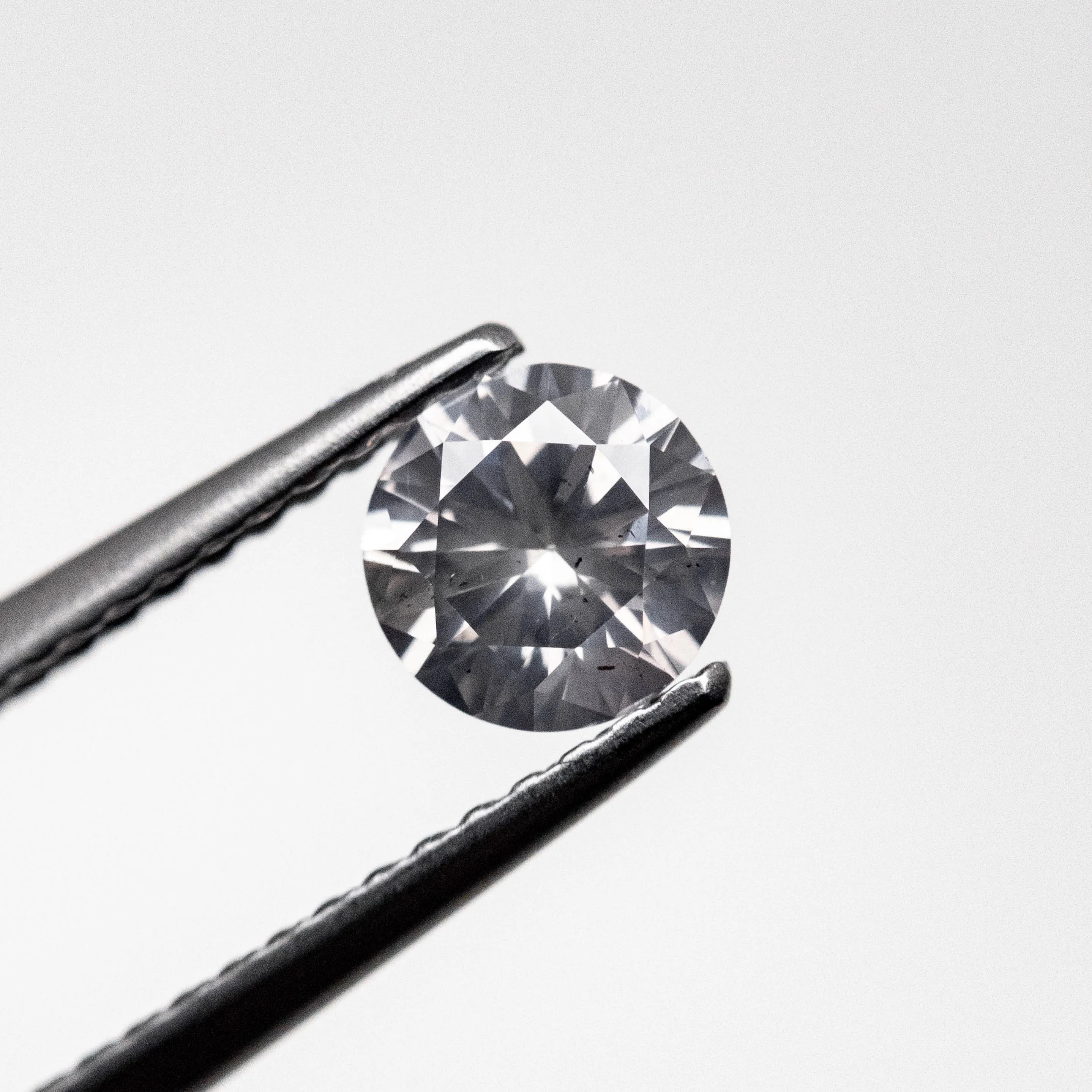 0.53ct 5.25-5.28x3.07 Fancy Grey Round Brilliant 18968-09