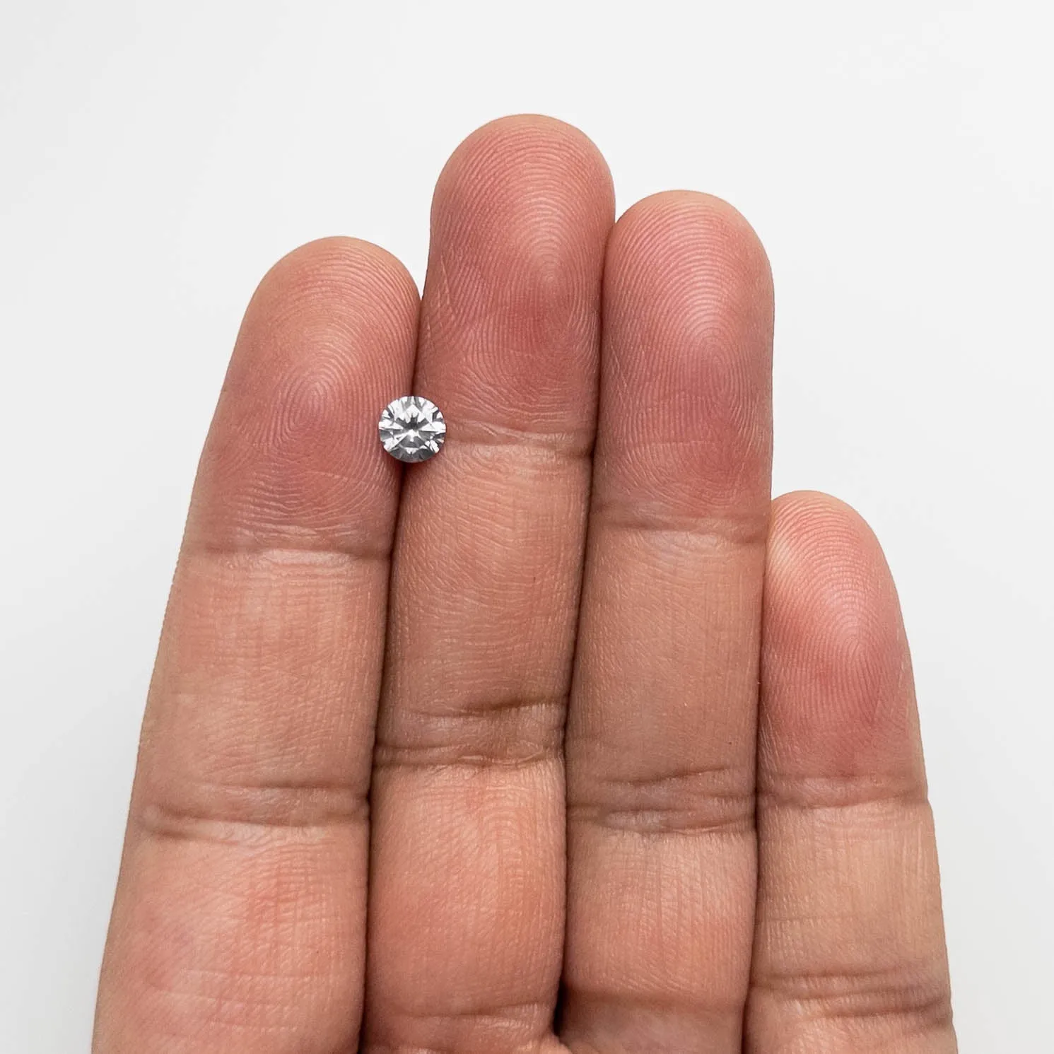 0.53ct 5.25-5.28x3.07 Fancy Grey Round Brilliant 18968-09