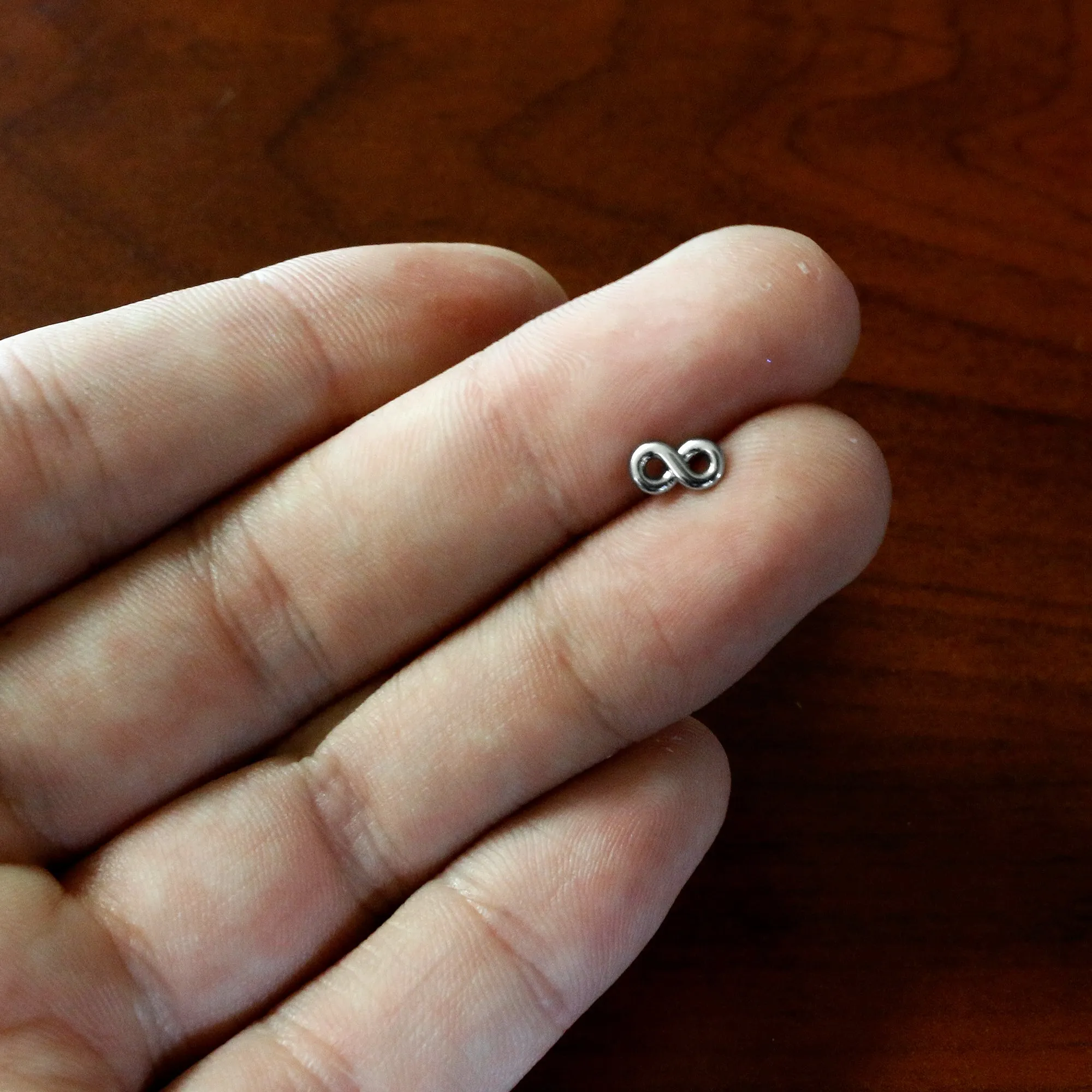 20 Gauge Gleaming Infinity Symbol Nose Screw