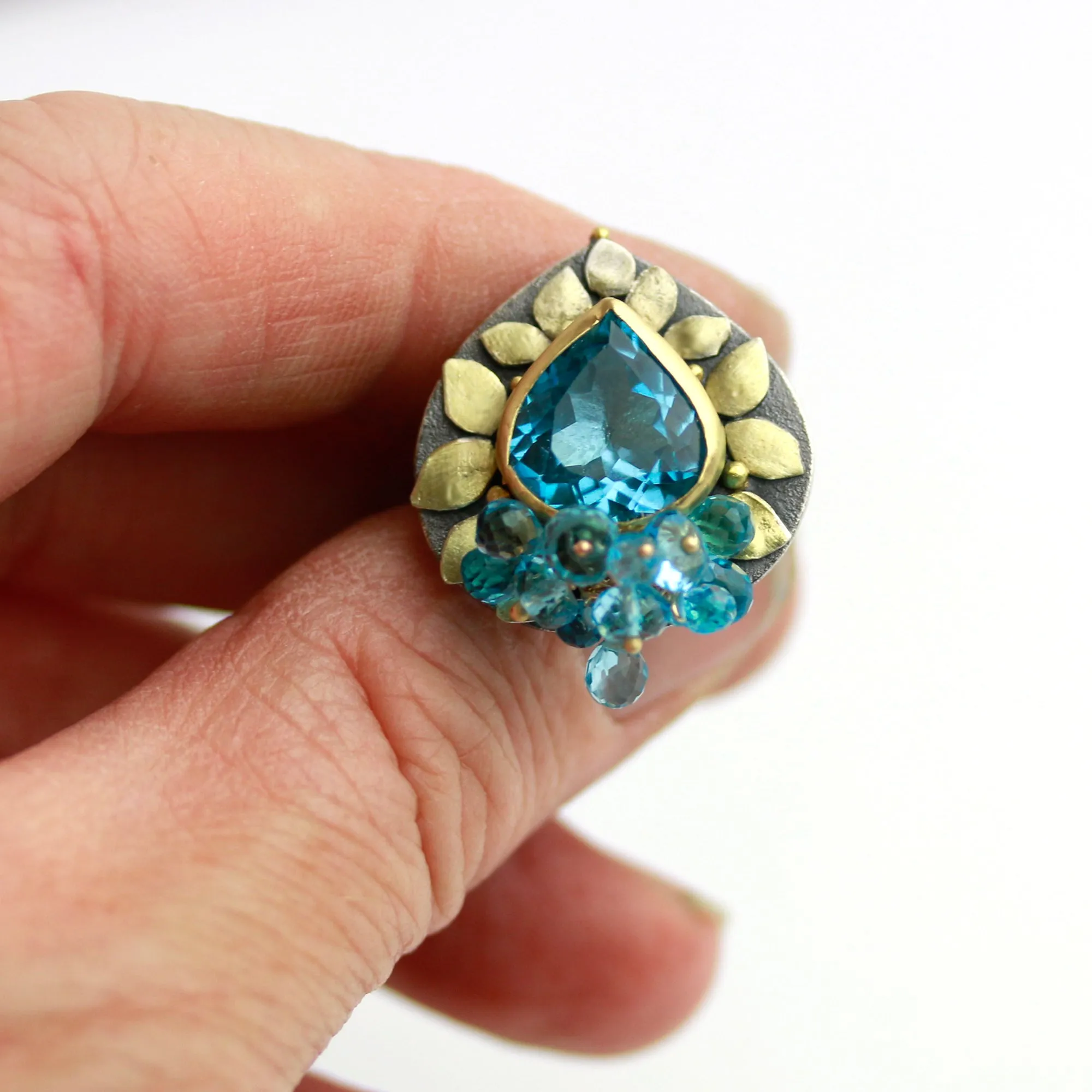 Blue Topaz and Gold Leaves Ring. Size 6 1/4.