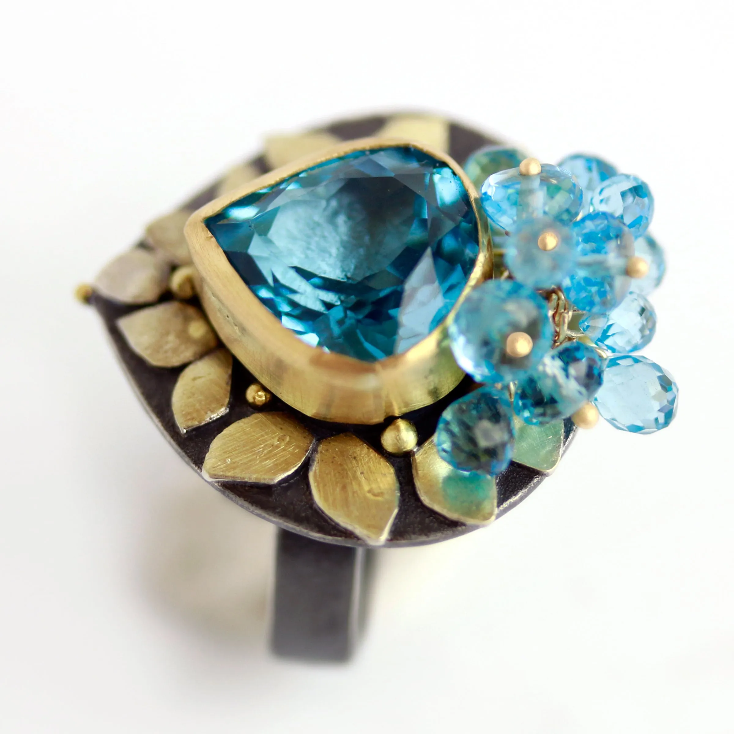 Blue Topaz and Gold Leaves Ring. Size 6 1/4.