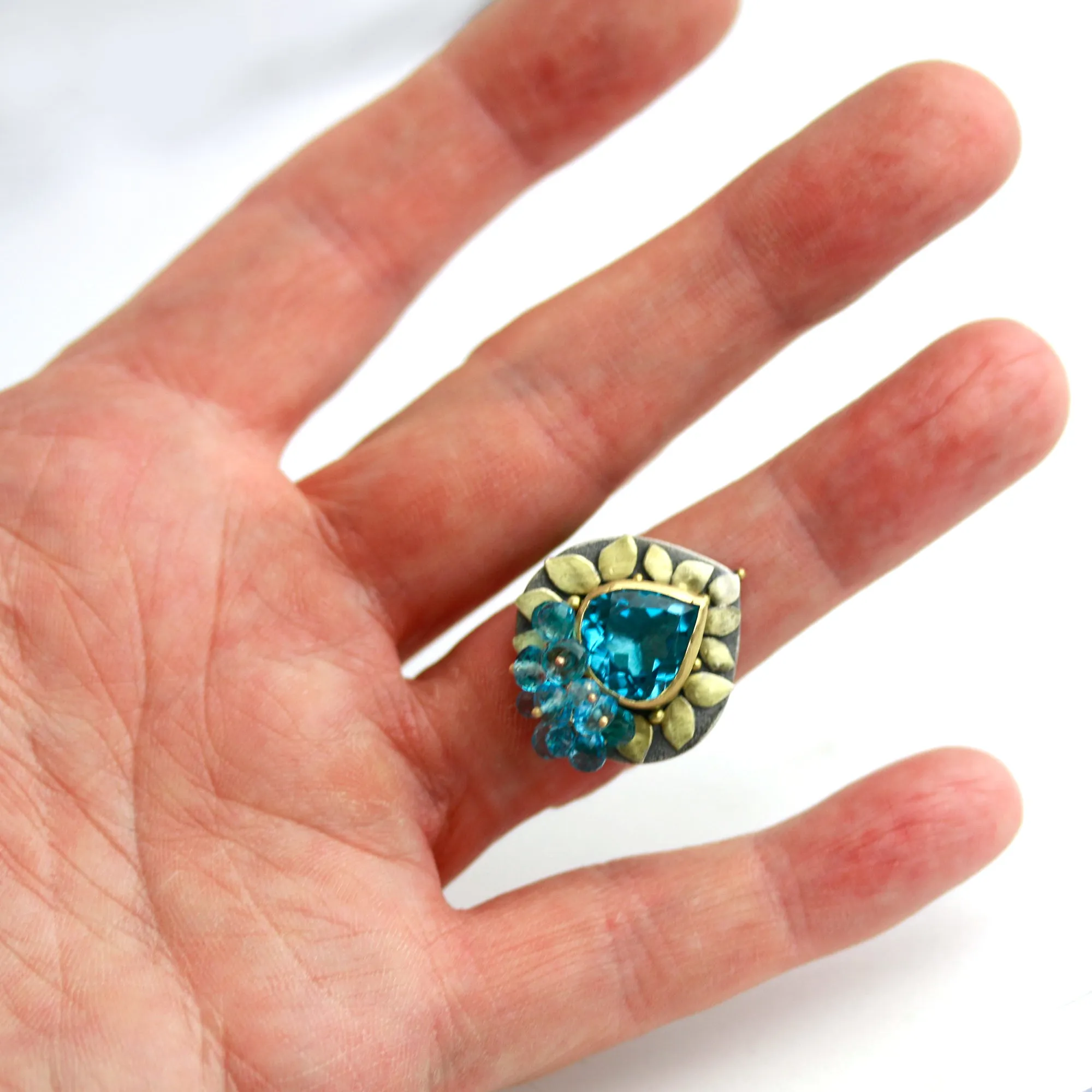 Blue Topaz and Gold Leaves Ring. Size 6 1/4.