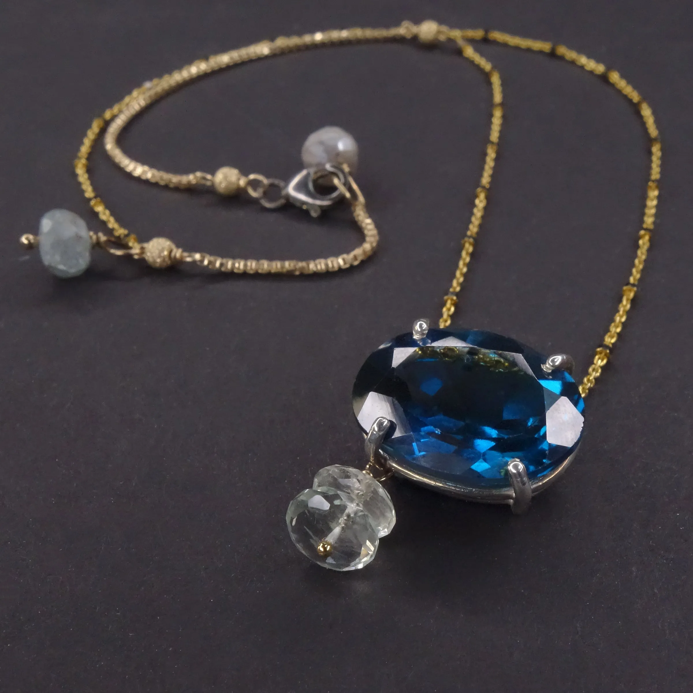 Here She Comes Just a Walkin' Down the Street: London blue topaz on gold