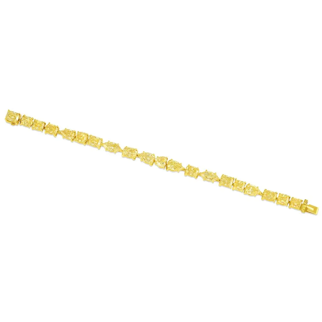 Rivière 18kt Yellow Gold Fancy Intense Yellow Diamond Multi-Shaped Bracelet, GIA Certified