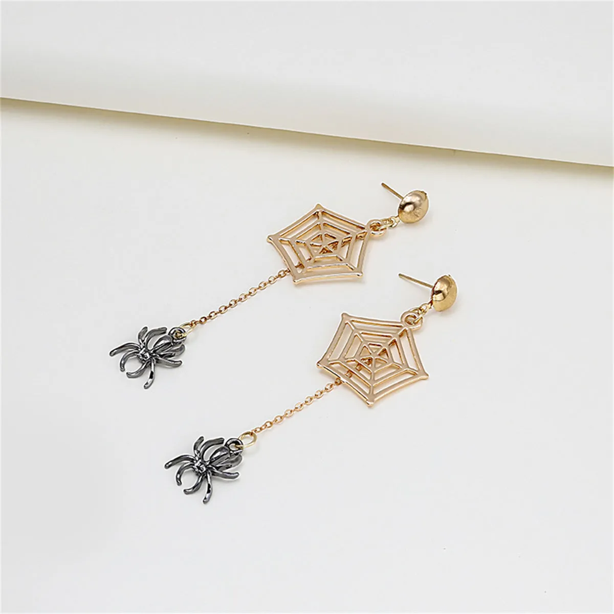 Two-Tone Spider & Web Drop Earrings